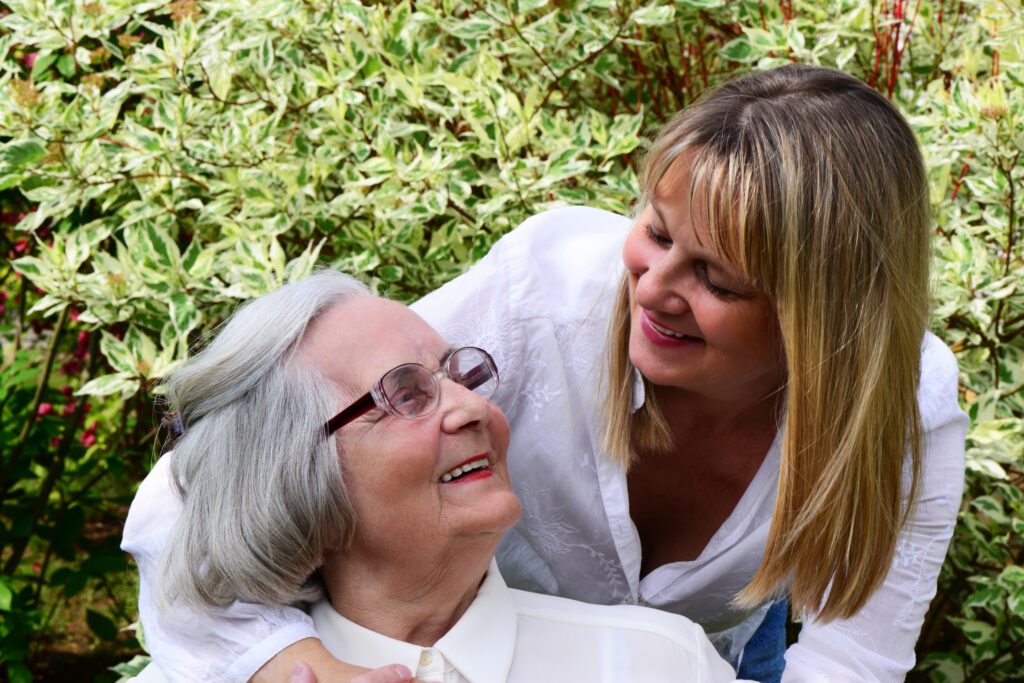 Guardian caring for an elderly woman