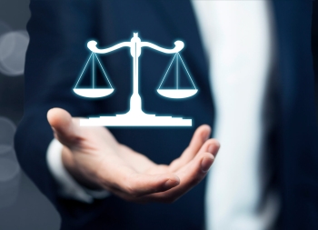 Law concept above the hands of a man in background