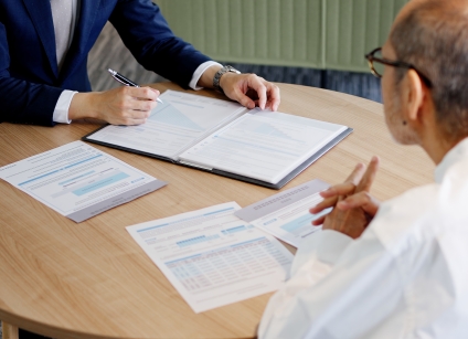 Person talking to an attorney about setting up a trust.